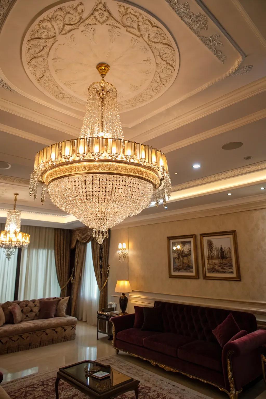 A luxurious chandelier introduces grandeur to the living room.