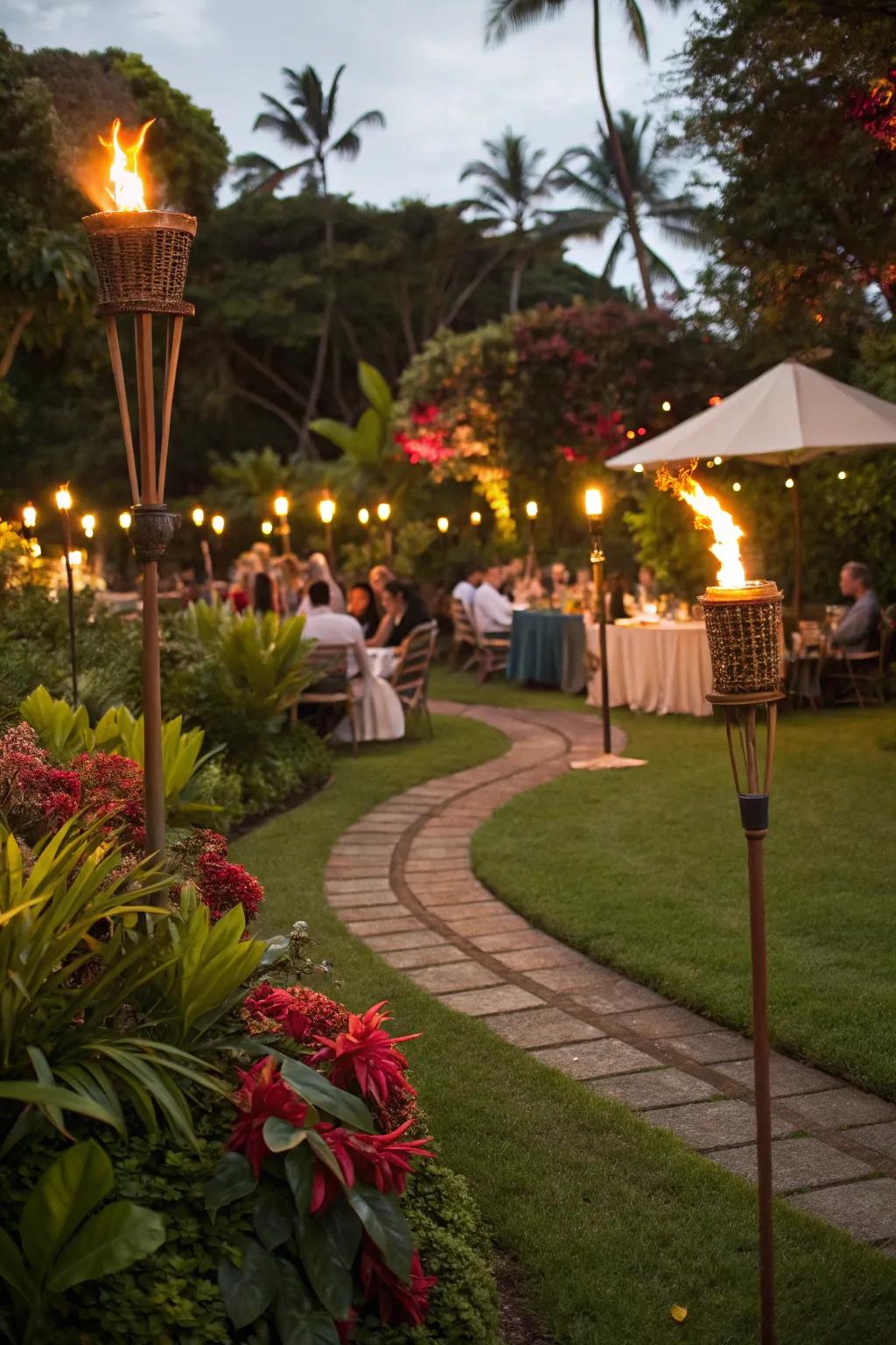 Tiki torches illuminate the tropical ambiance.