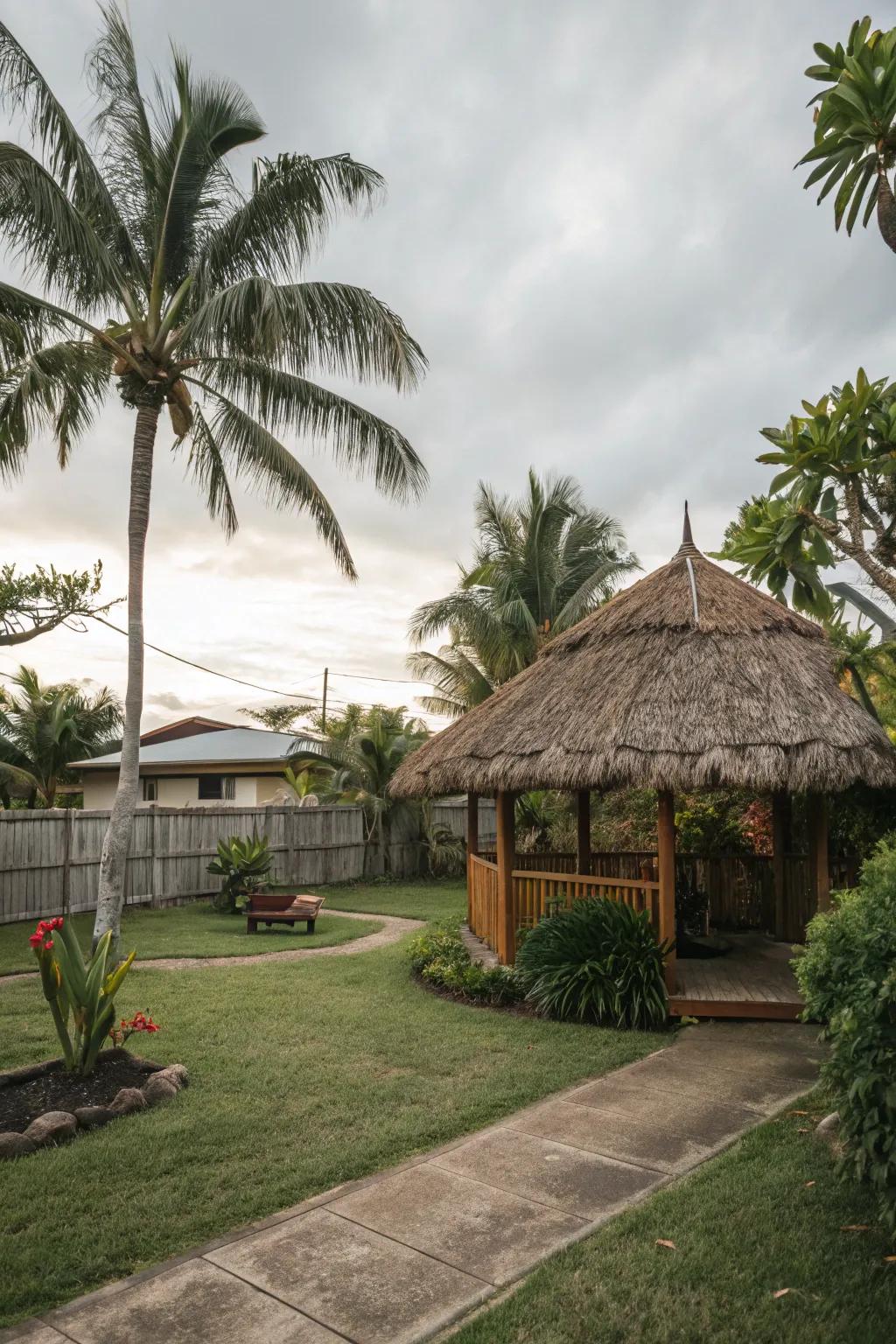 A thatched roof cabin extends a shaded, snug sanctuary in the backyard.