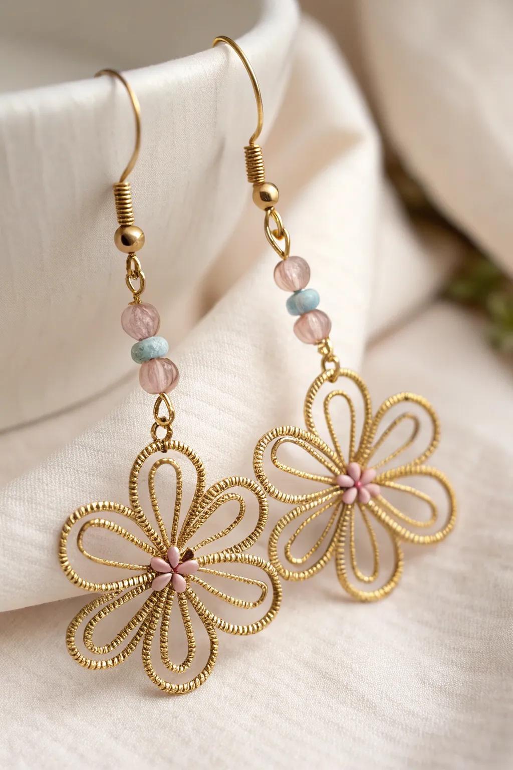 Welcome spring with these beautiful floral wire earrings, a fantastic blend of minimalist sophistication and bohemian charm.