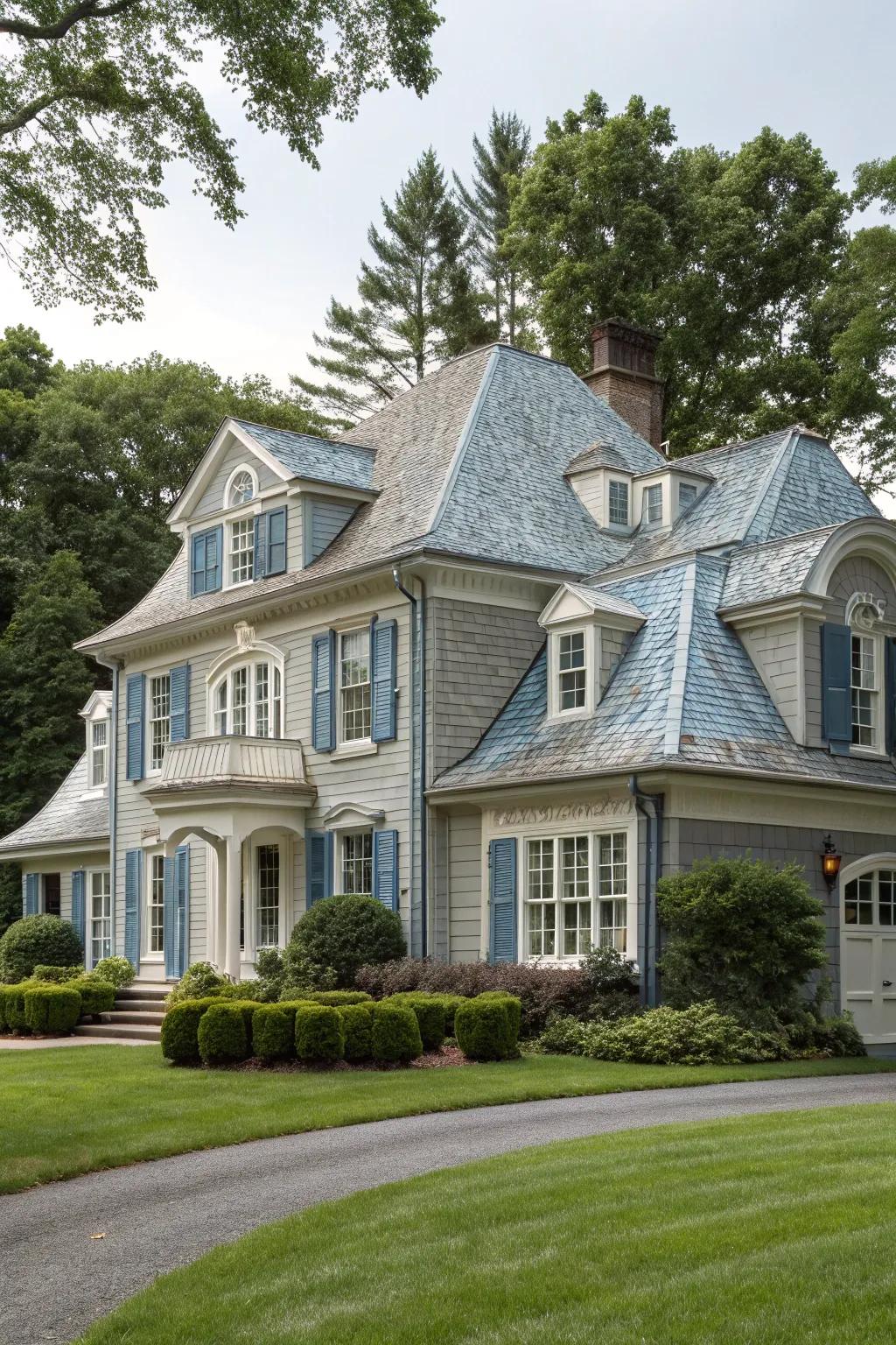 Colonial home featuring a sophisticated blend of grey and blue tones.