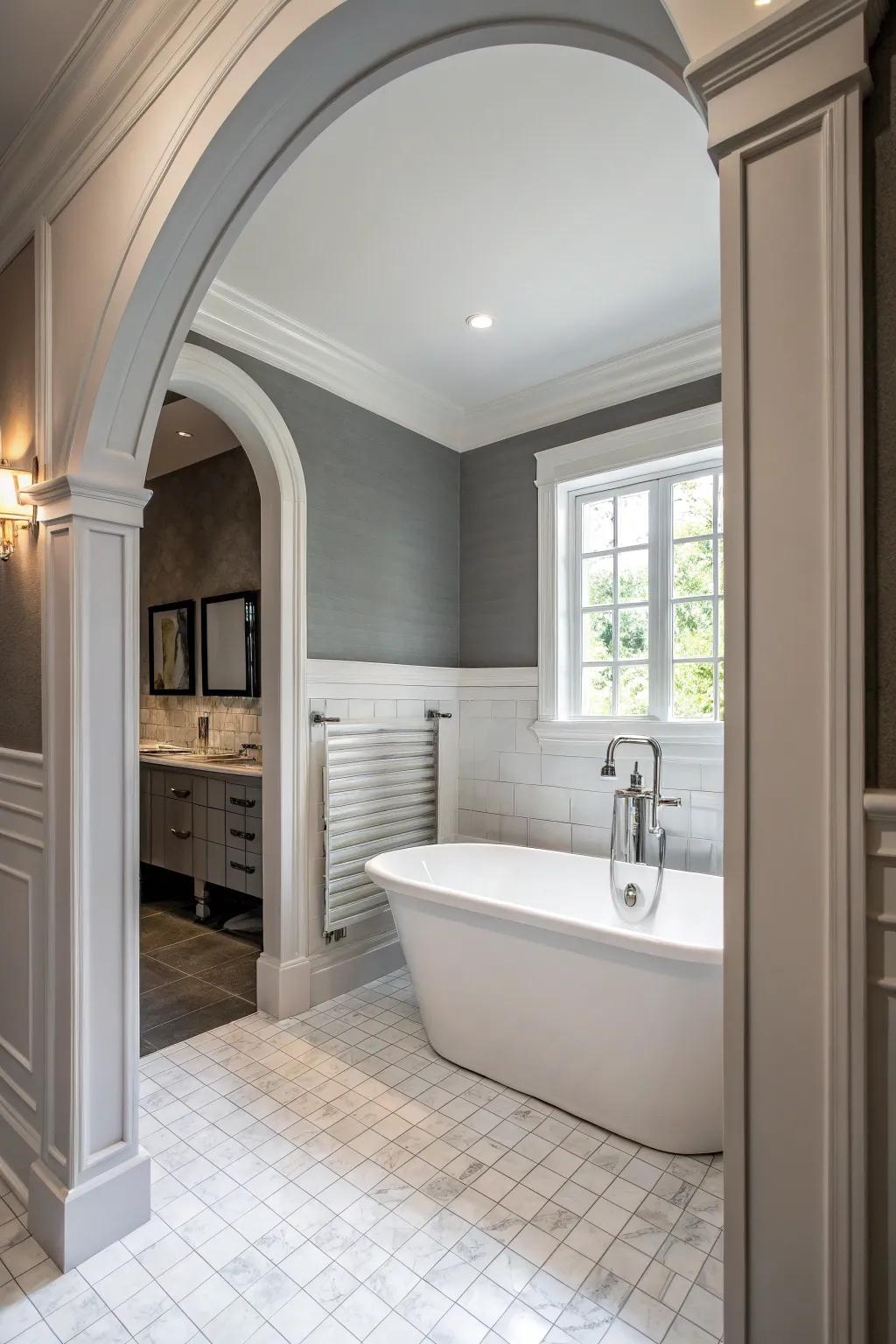 Grey walls and white features result in a traditional and unified bathroom design.