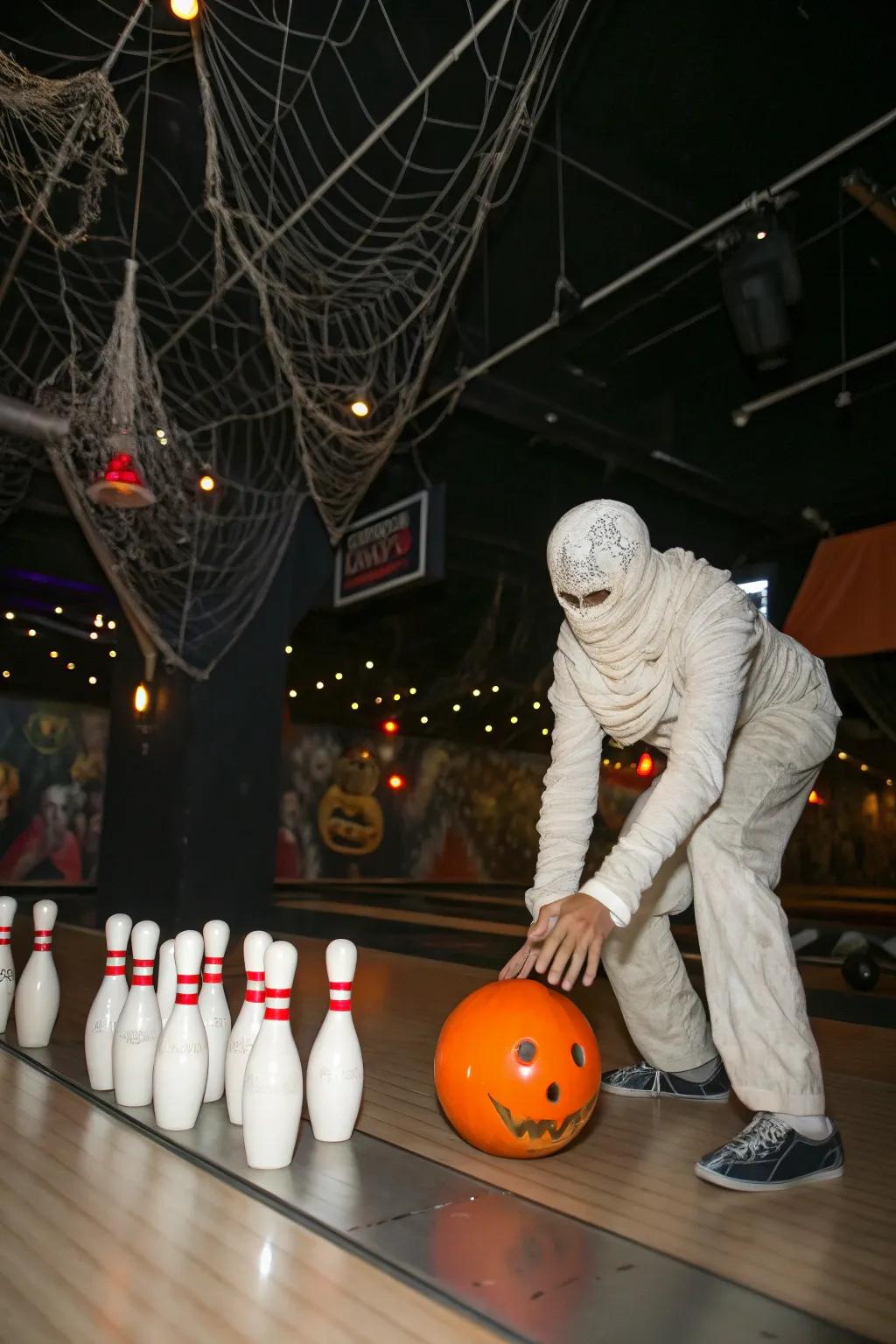 Achieve a strike with a spooky bandaged figure alley.