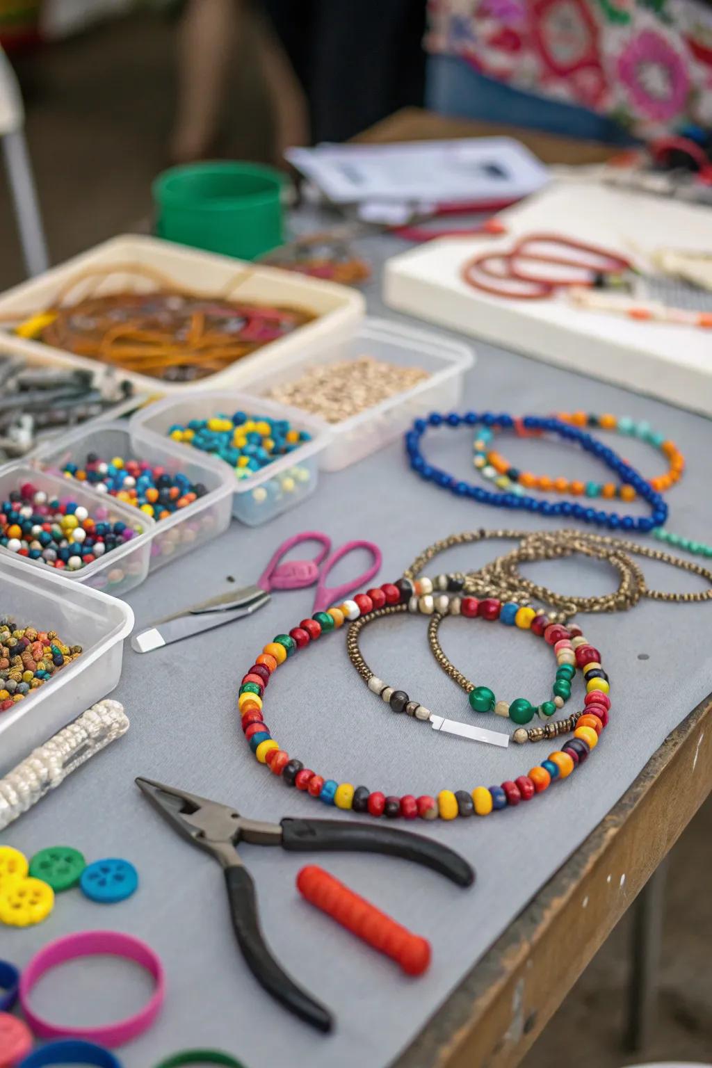 A necklace-making spot offers guests a creative activity and a token from the party
