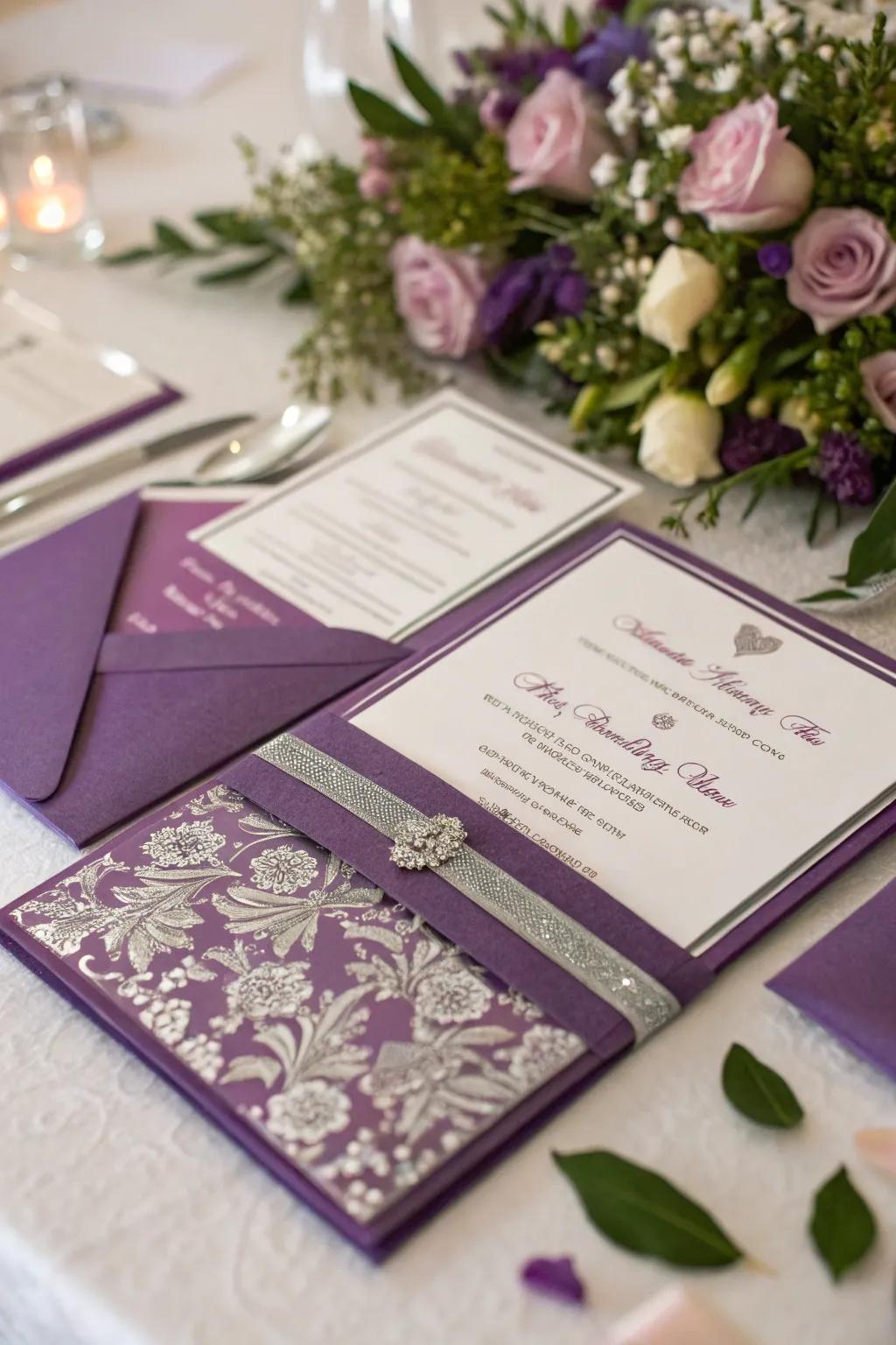 Purple and silver invitations set the stage for a sophisticated wedding.