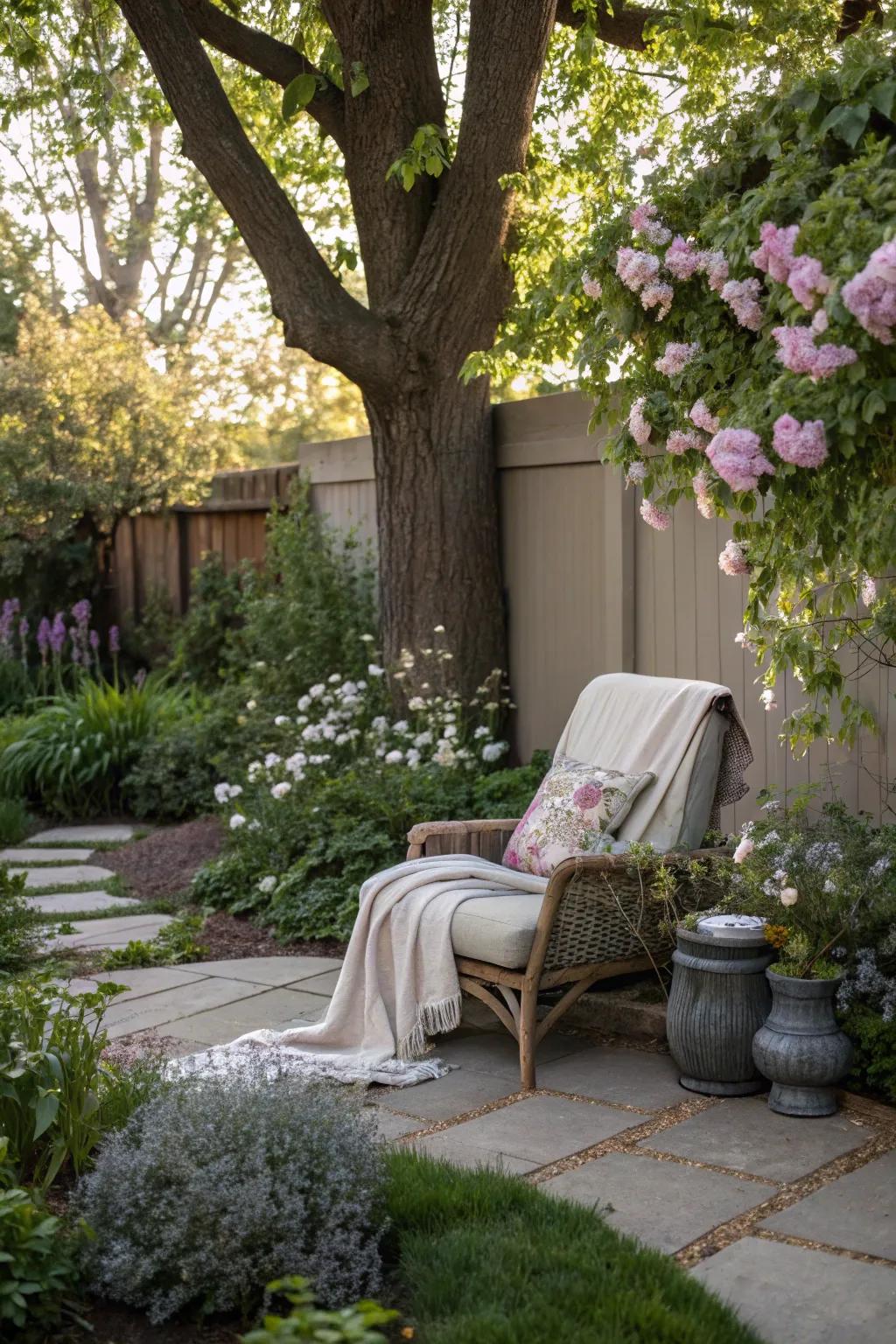 A tranquil garden nook where a tree provides a peaceful setting.