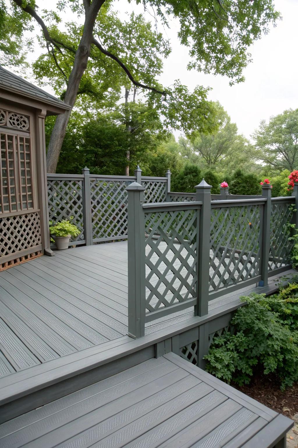 Privacy-enhancing lattice railings on a grey deck.
