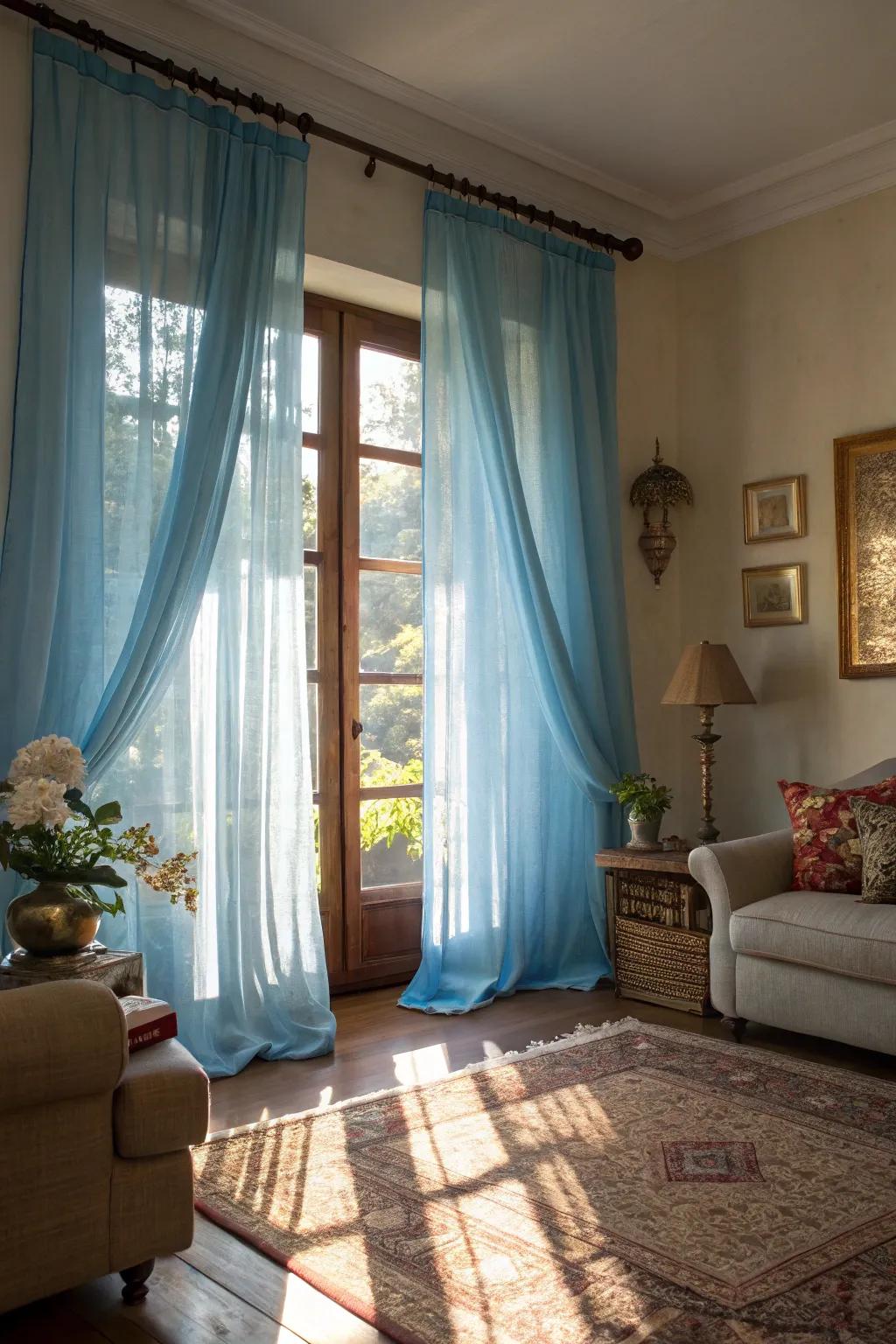 Airy sky-hue drapes create a play of illumination and shadow, enriching the area with depth and visual allure.