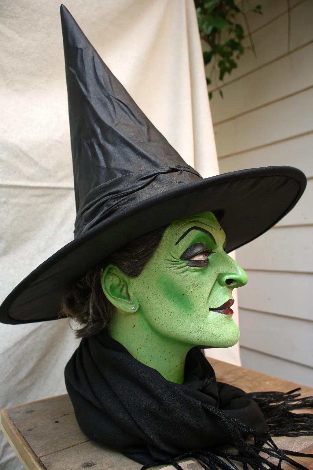 A witch's head that gives the impression of brewing mischief.