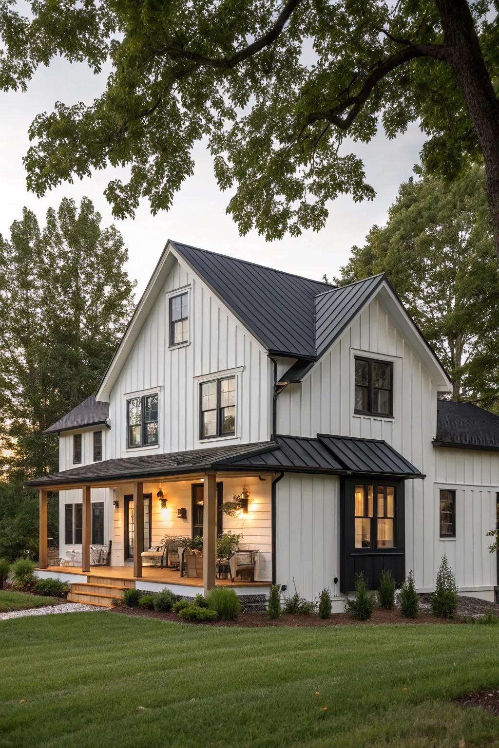 A modern country home featuring light cladding and dark accents.