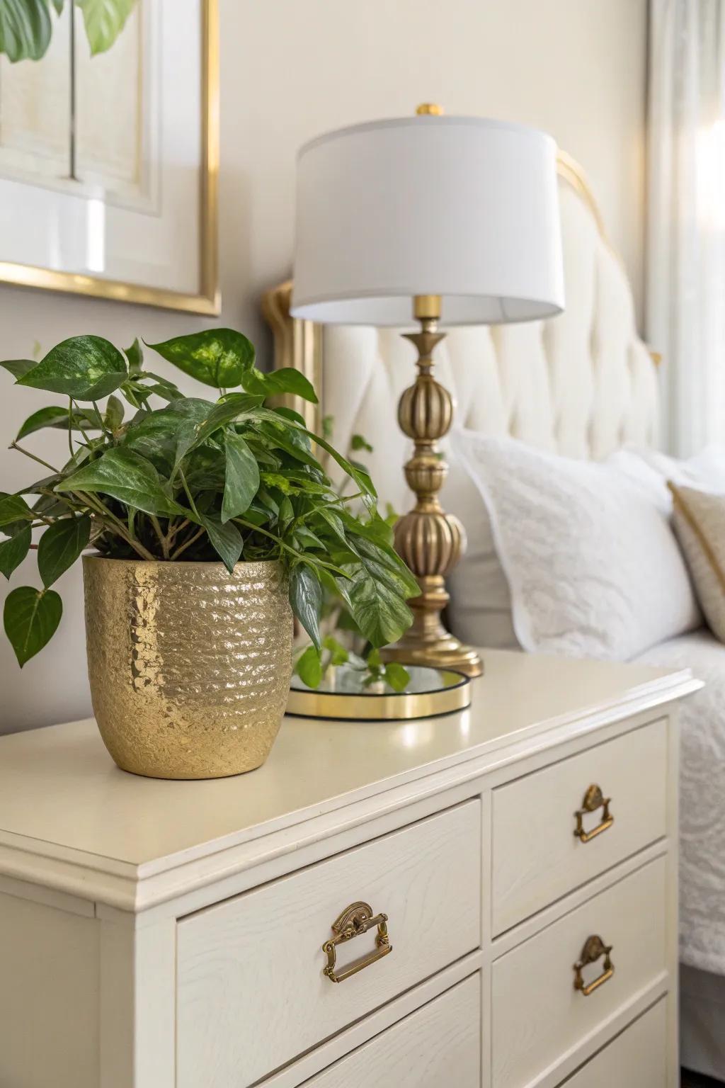 Flora contained within a gilt pot introduces a revitalizing element to the boudoir.