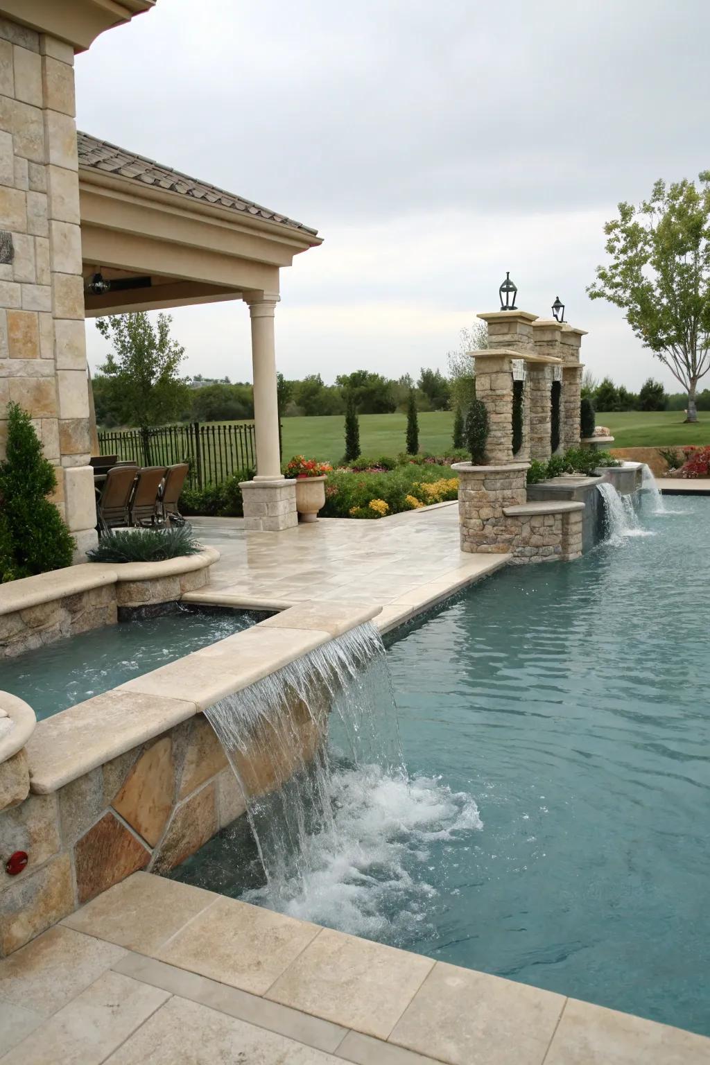 A pool boasting luxurious finishes, displaying exquisite tile and stone craftsmanship.