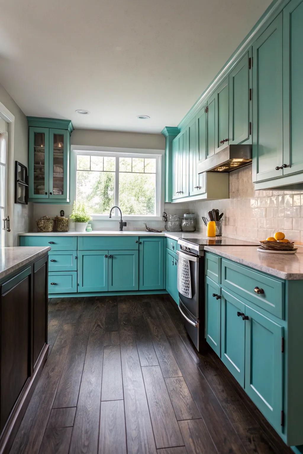 Dramatic shadowed floors complementing turquoise kitchen cabinets.