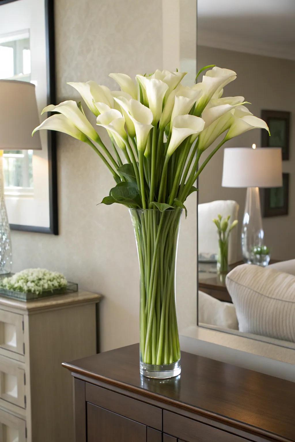 Elegant calla lily arrangement infusing sophistication into a dining area.