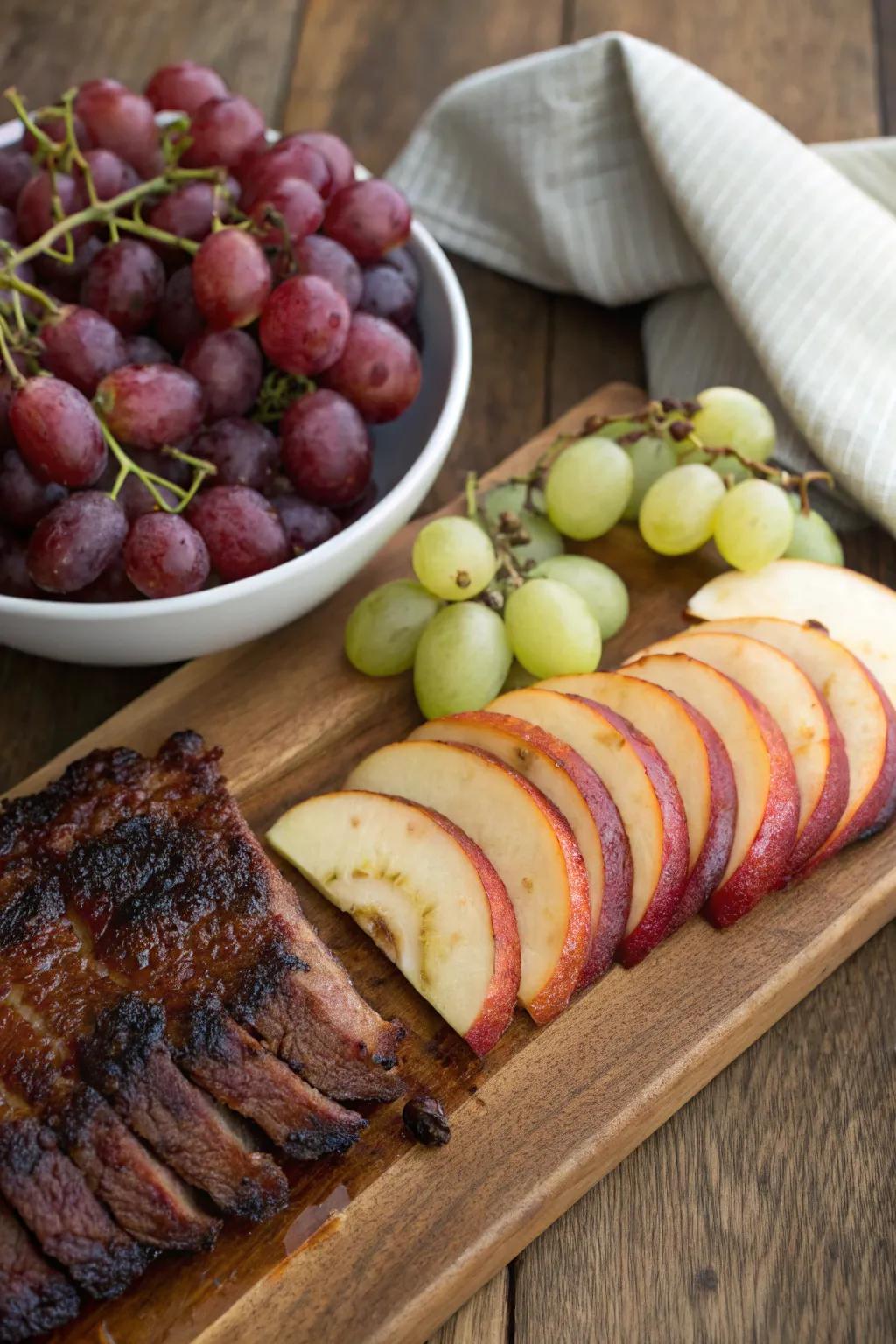 Fresh fruits introduce a sweet contrast to the savory meats.